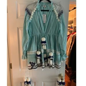 Beautiful summery light blue dress with Pom Poms